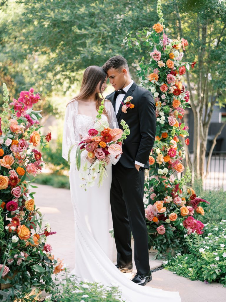 Couple weds adorned with florals at Sophie's Gasthaus intimate wedding